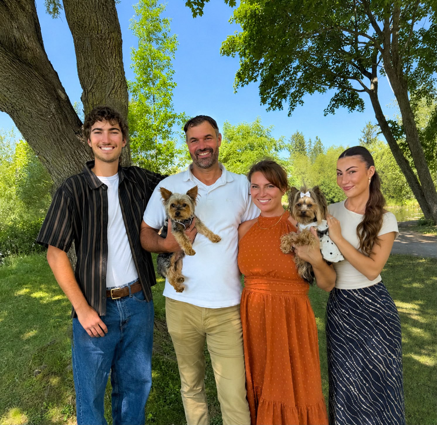 Joel and Ikeda Rowswell with Keliyah and Kylan at a family graduation celebration